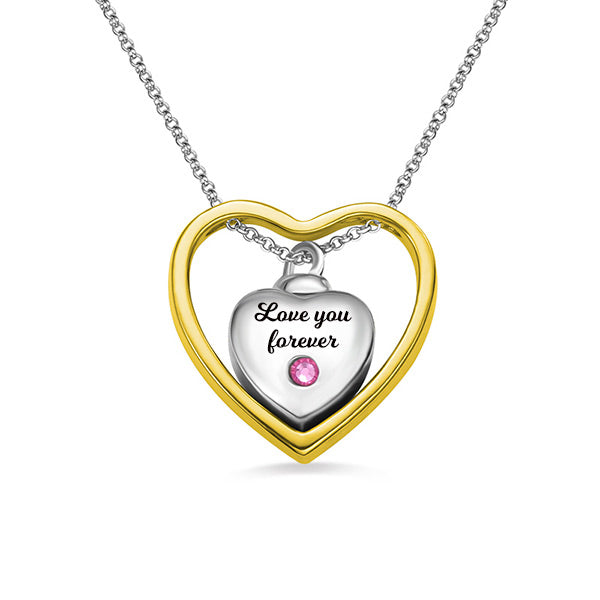 Silver heart pendant with 'Love you forever' inscription and a pink gem, framed by a gold heart, on a silver chain.