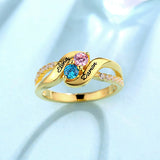 Gold-plated birthstone ring with 'Elena' and 'Darren' inscriptions and crystal accents.