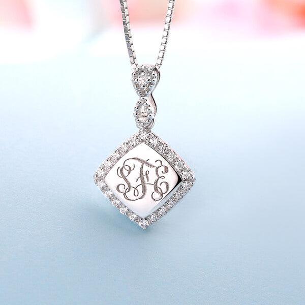 Close-up of Custom Diamond Monogram Necklace in Sterling Silver 925 with Infinity Symbol, featuring personalized engraving and dazzling simulated diamonds.