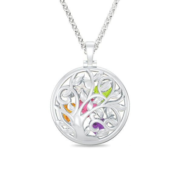 A silver necklace with a circular pendant featuring an intricate tree design and multicolored gemstones embedded within the branches.