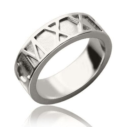 Silver ring with geometric triangular patterns on the outer band and a smooth, reflective inner surface.