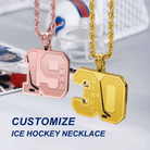 Two customized hockey-themed necklaces: one rose gold with "EMMA" and number 19, and one gold with "HENRY" and number 30, with a hockey gear background. Text reads "CUSTOMIZE ICE HOCKEY NECKLACE."