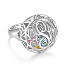 Silver ring with an intricate Celtic knot design encasing colorful, eye-shaped birthstones.