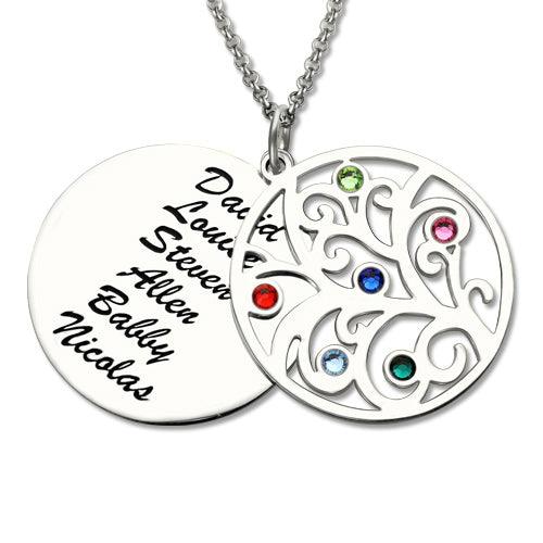 A round double silver pendant necklace. The front pendant has an intricate cutout design with colored gemstones. The back pendant is engraved with the names David, Louise, Steven, Allen, Bobby, and Nicolas.