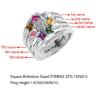 A silver ring with a star-shaped arrangement of seven colorful gemstones, each numbered, and engraved names corresponding to each stone, along with size specifications at the bottom.