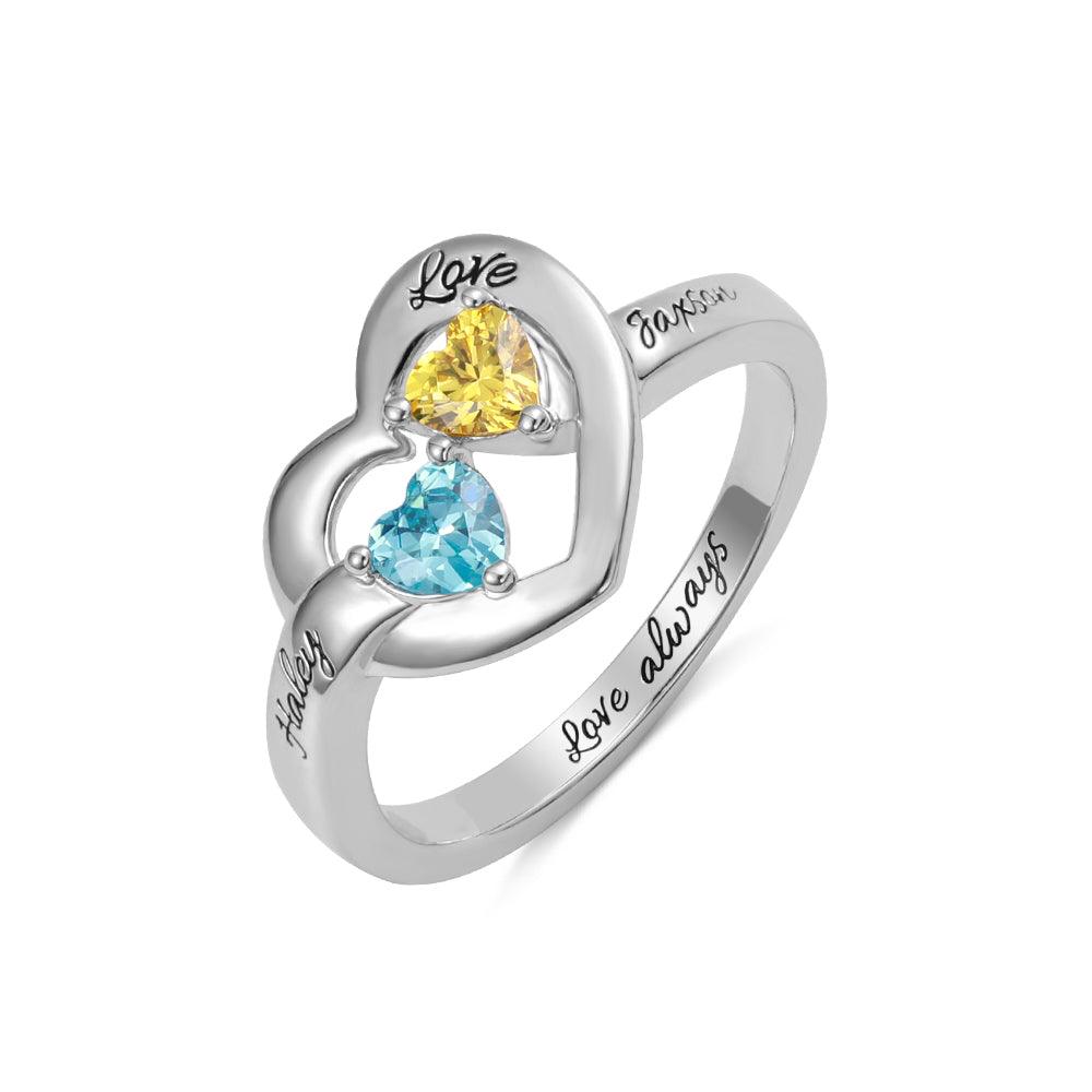 Personalized silver ring with yellow and blue heart-shaped gemstones, engraved with 'Love,' 'Haley,' 'Jaxson,' and 'Love always,' symbolizing enduring affection.