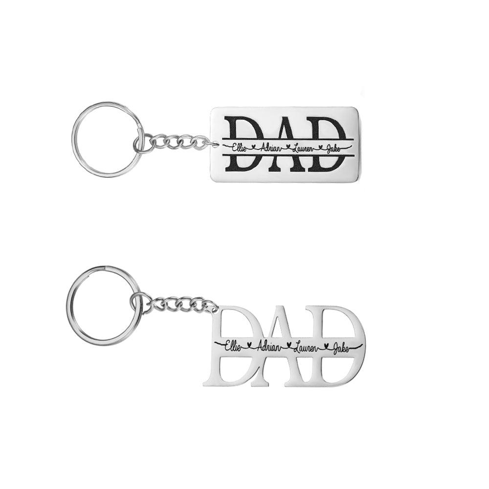 Two personalized keychains with "DAD" in large letters, names "Ellie, Adrian, Lauren, Jake" scripted across.