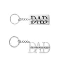 Two personalized keychains with "DAD" in large letters, names "Ellie, Adrian, Lauren, Jake" scripted across.