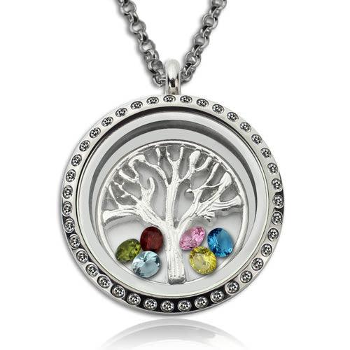 A silver tree of life pendant with six colorful gemstones (blue, pink, green, yellow, red, and light green) surrounded by small crystals on a silver chain necklace.