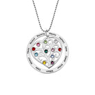 Silver heart-shaped family tree necklace with names and birthstones on a chain.