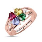 Rose gold ring with four heart-shaped multicolored gems and engraved names "Olivia," "Rebecca," "Sandy," "Joshua" with "We love you mommy."