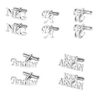 Assorted silver cufflinks with personalized monograms and names, including 'NG', 'BA', 'Andrew', and 'K&N'