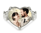 Personalized sterling silver heart-shaped memorial photo ring featuring a custom picture of a smiling couple, perfect for keeping cherished memories close.